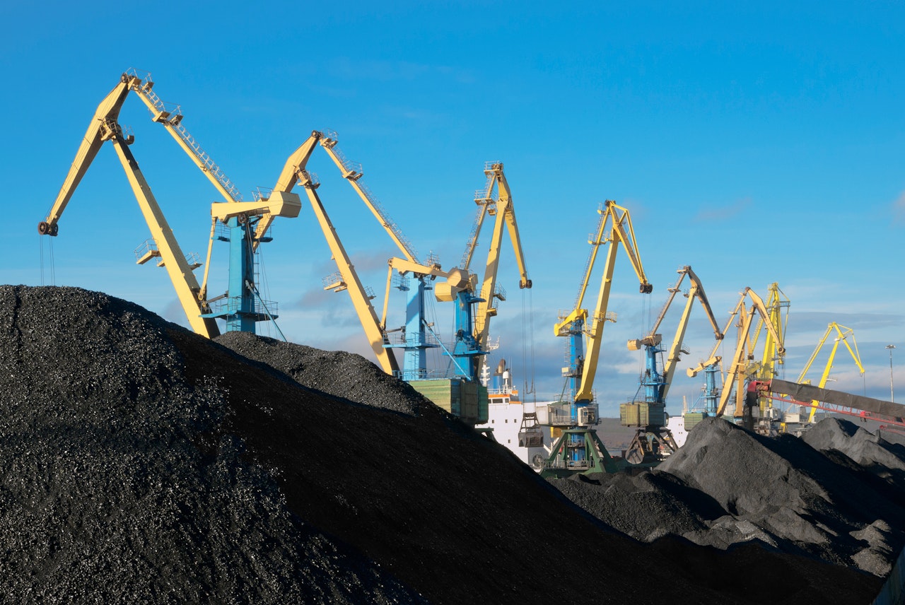 Photo Showing Portal Cranes Over Huge Heaps Of Coal In The Murmansk Commercial Seaport Russia Shutterstock 1978777190